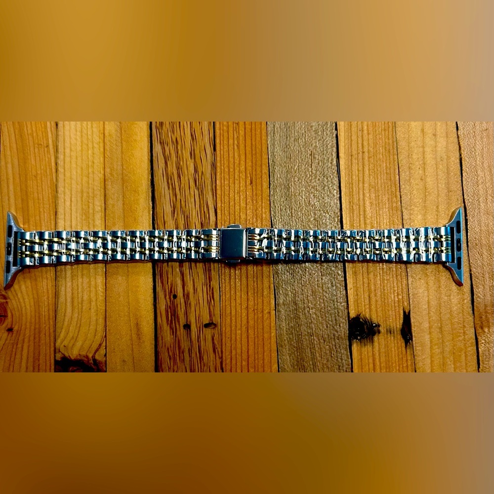 Stainless steel multi colored watch band compatible with Apple Watch.